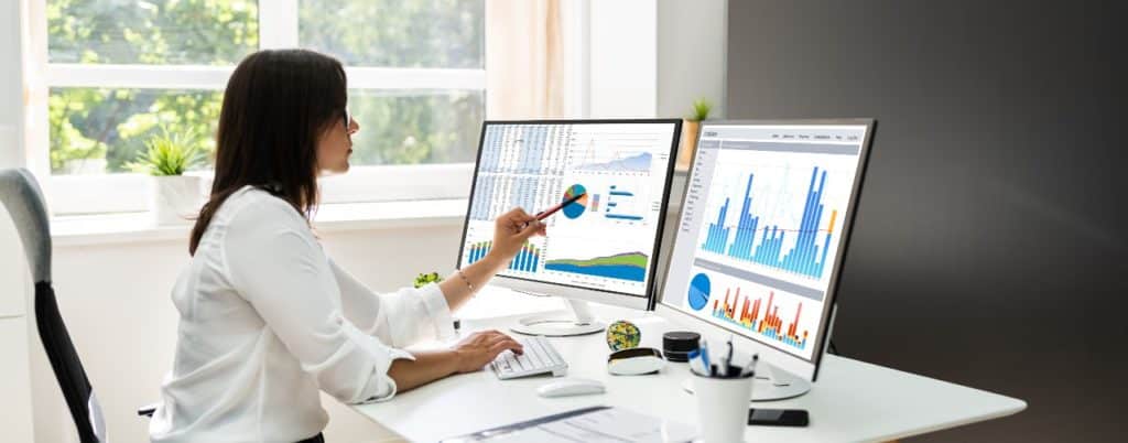 Analyst Women Looking At KPI Data